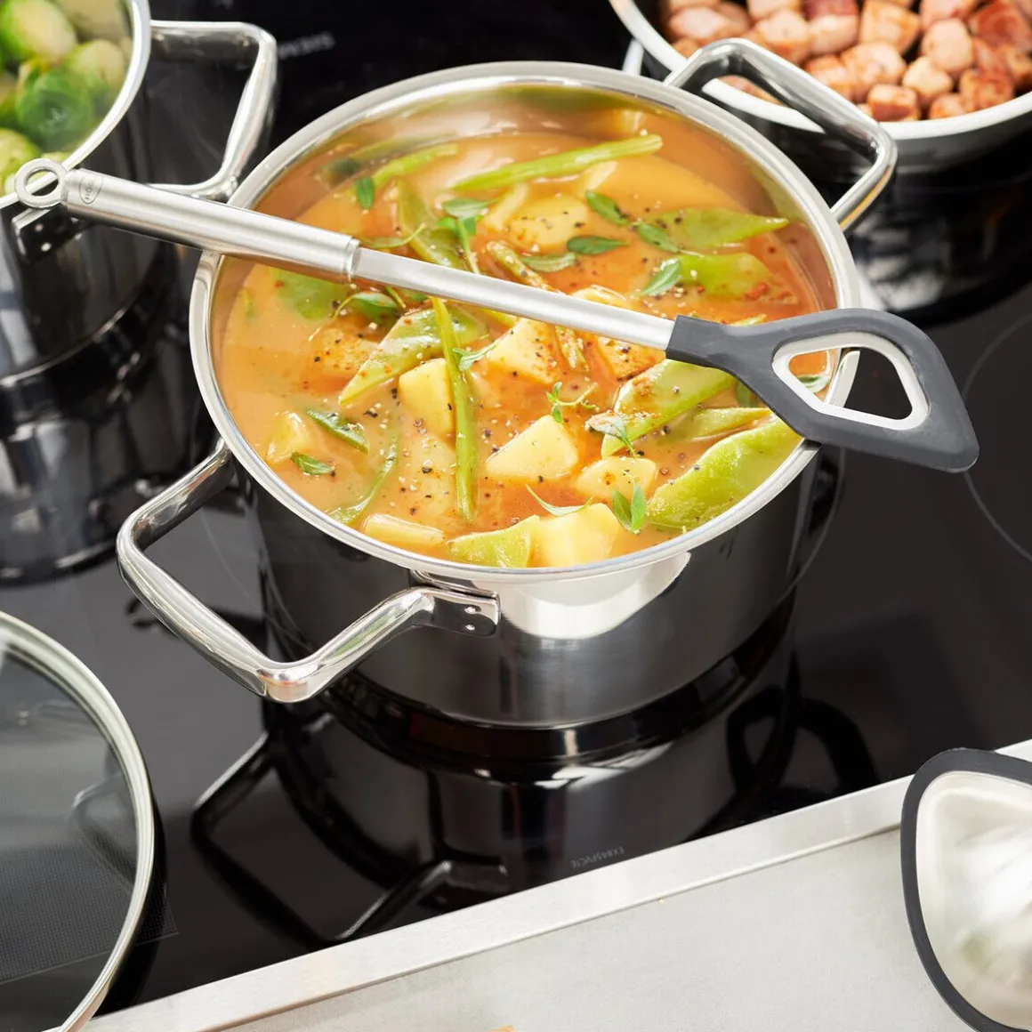 RösleKochlöffel mit Loch Rundgriff mit Silikonrand 32,5cm